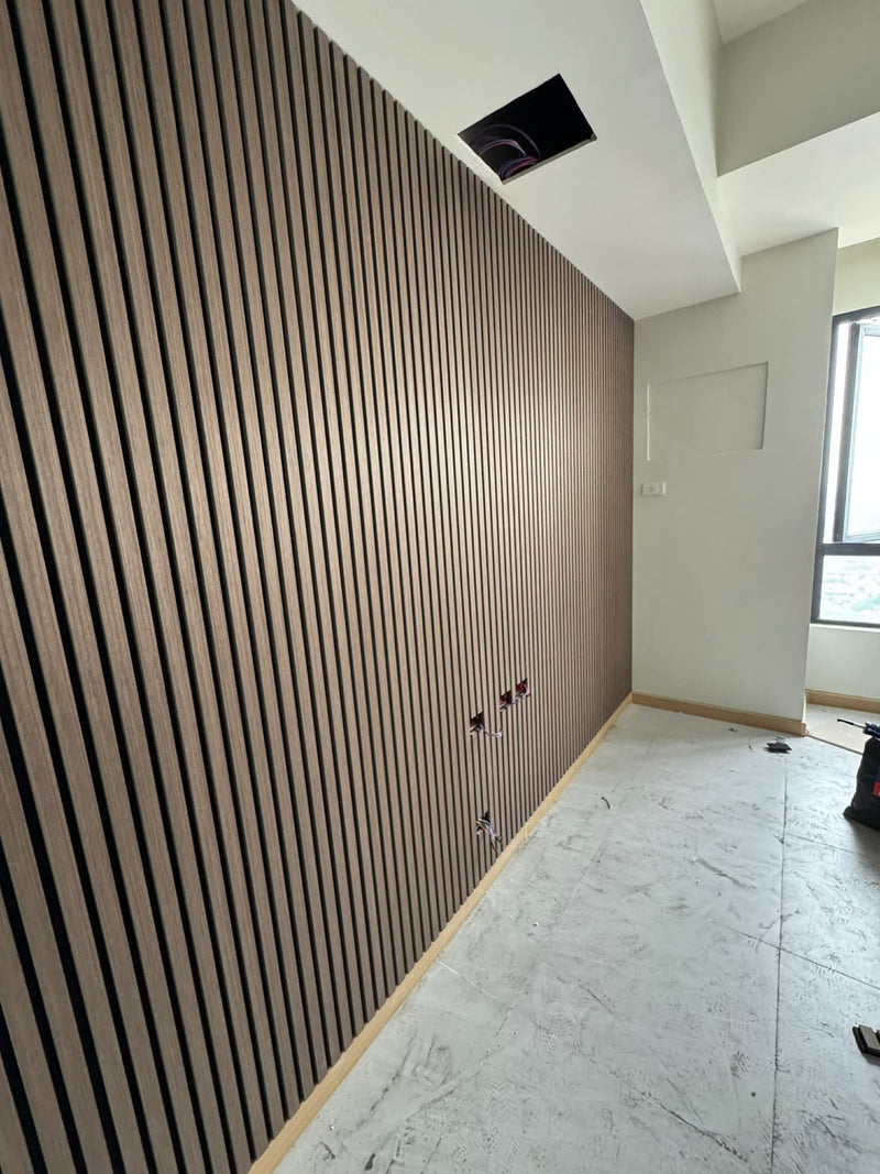 Room interior with wooden slat wall and white floor
