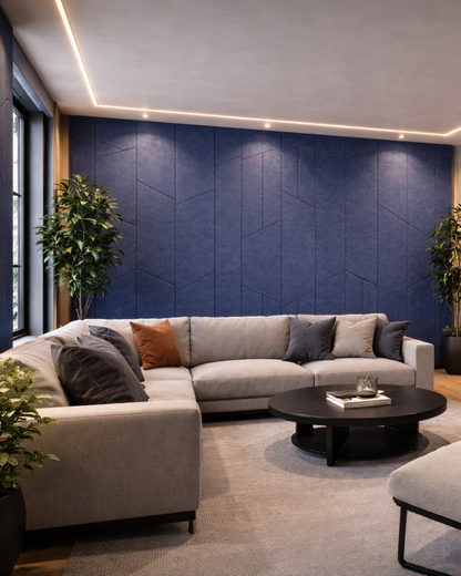 Modern living room with a sectional sofa, coffee table, and decorative pillows against a blue Acoustic PET Panel.