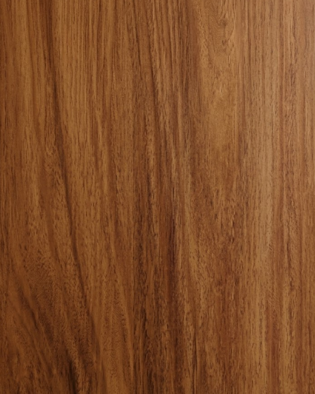 A close-up of a warm medium-brown wood grain texture with vertical lines and natural tonal variation.