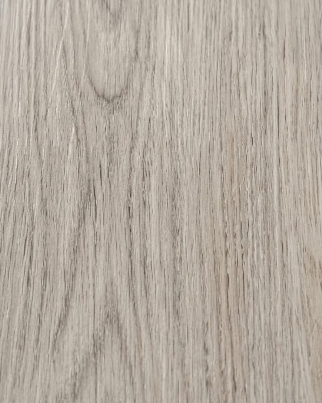 Close up of Fossil Oak SPC flooring with weathered wood grain