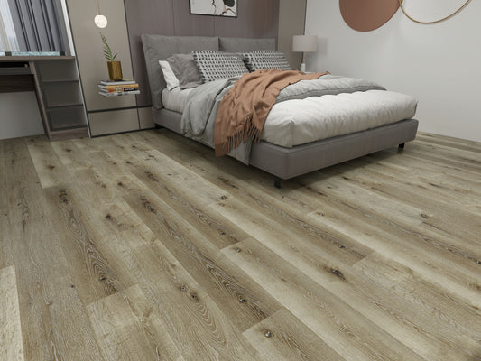 Bedroom with White Oak Vinyl Plank Flooring and a bed with gray bedding.