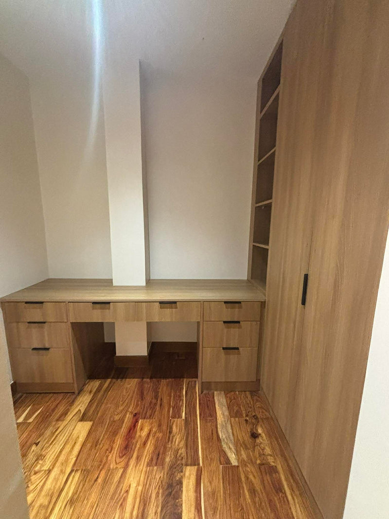 Wooden desk and bookshelf in a room with Vinyl flooring By Wood Panel Philippines.