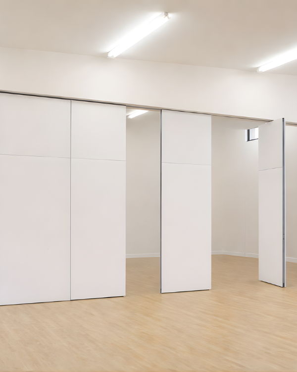 Soundproof Wall Partition Modern interior with white sliding doors and a light wood floor.