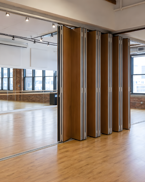 Set of Soundproof Wall Partition walls in a room with large windows.